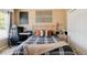 Well-lit bedroom with modern decor and a dedicated workspace at 10069 E 28Th Ave, Denver, CO 80238