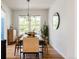 Chic dining room boasting natural light, contemporary furnishings, and stylish decor for a cozy atmosphere at 10069 E 28Th Ave, Denver, CO 80238