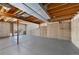 Unfinished basement with exposed ducts, beams, and concrete walls ready for customization at 19697 E Flora Pl, Aurora, CO 80013