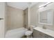 Bathroom featuring a shower with tan tile, a bathtub, modern vanity, and updated fixtures at 19697 E Flora Pl, Aurora, CO 80013