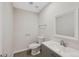Cozy powder room featuring neutral walls and a grey vanity at 19697 E Flora Pl, Aurora, CO 80013