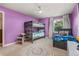 Playful bedroom featuring a bunkbed, a single bed, colorful decor, and a window at 2555 S Zang St, Denver, CO 80228