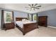 Spacious main bedroom featuring tray ceilings, ample natural light, and neutral tones at 2555 S Zang St, Denver, CO 80228