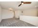 Bonus room featuring neutral walls, carpet, and access to other rooms at 21701 E 50Th Dr, Aurora, CO 80019