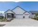 Attractive single-Gathering home with a three-car garage and easy access with a wide driveway for Gathering and guests at 21701 E 50Th Dr, Aurora, CO 80019