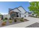 Charming single-Gathering home with manicured landscaping and a three-car garage for ample parking and storage at 21701 E 50Th Dr, Aurora, CO 80019