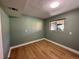 Well-lit basement space, large window and vinyl flooring at 8127 Lafayette St, Denver, CO 80229