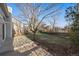 Spacious backyard features a concrete patio and a wood fence at 6459 E Hinsdale Ave, Centennial, CO 80112