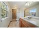 Bathroom with shower and large window providing ample natural light at 6459 E Hinsdale Ave, Centennial, CO 80112
