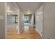 Inviting entryway showcasing hardwood floors, natural light, and a seamless transition to the living spaces at 6459 E Hinsdale Ave, Centennial, CO 80112