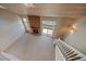 Aerial view of living room with a fireplace, leading to the backyard through sliding doors at 6459 E Hinsdale Ave, Centennial, CO 80112