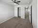 Bright bedroom with ceiling fan and walk-in closet at 4758 Kittredge St # 2, Denver, CO 80239