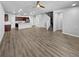 Open concept living area with kitchen and staircase views at 4758 Kittredge St # 2, Denver, CO 80239