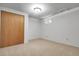 Bedroom with carpet and a closet with doors at 11936 E Oregon Cir, Aurora, CO 80012