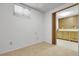 Bedroom with carpet and closet at 11936 E Oregon Cir, Aurora, CO 80012