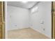 Cozy bedroom featuring neutral carpet, window for natural light, and closet at 11936 E Oregon Cir, Aurora, CO 80012