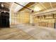 The interior of the garage has built-in shelving and storage space at 11936 E Oregon Cir, Aurora, CO 80012