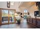 Bright foyer with high ceilings and large windows offering stunning views at 4520 Forest Hill Rd, Evergreen, CO 80439