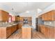 Beautiful kitchen with island, stainless appliances, and generous cabinetry at 9650 Raven St, Firestone, CO 80504