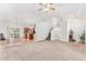 Open-concept living space features a seamless flow into kitchen at 9650 Raven St, Firestone, CO 80504