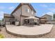 Spacious patio with outdoor seating, gazebo, and hot tub perfect for entertaining at 9650 Raven St, Firestone, CO 80504