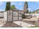 Charming backyard shed with rustic decor, adding character to the outdoor space at 9650 Raven St, Firestone, CO 80504