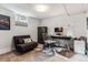 Cozy home office features a modern desk setup, a compact sofa, and neutral decor, creating a practical workspace at 3145 W 31St Ave, Denver, CO 80211