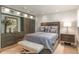 Beautiful bedroom with custom built-ins, recessed lighting, and stylish furniture at 3401 E Kentucky Ave, Denver, CO 80209