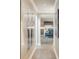 Hallway with an open concept view to the kitchen, and decor at 3401 E Kentucky Ave, Denver, CO 80209