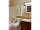Bathroom featuring a shower/tub, toilet, vanity and medicine cabinet at 11318 Clermont Dr, Thornton, CO 80233