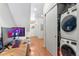 Upstairs hallway featuring a laundry area at 2640 Central Ct # 104, Denver, CO 80211