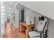 Hallway leading to the kitchen and back patio with a view of the workspace at 2640 Central Ct # 104, Denver, CO 80211