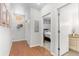 Hallway leading to a bedroom and bathroom at 2640 Central Ct # 104, Denver, CO 80211