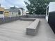 Spacious rooftop deck with built-in seating, perfect for outdoor entertaining and enjoying city views at 2640 Central Ct # 104, Denver, CO 80211