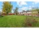 Large backyard with a grassy area and patio at 1586 S Field Ct, Lakewood, CO 80232