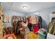 Spacious basement closet with ample shelving and hanging space at 1586 S Field Ct, Lakewood, CO 80232