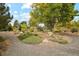 Landscaped garden with pathways and benches at 1586 S Field Ct, Lakewood, CO 80232