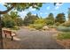 Park-like garden with gravel paths and benches at 1586 S Field Ct, Lakewood, CO 80232