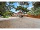 Ranch-style home with gravel driveway at 1586 S Field Ct, Lakewood, CO 80232