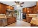 Eat-in kitchen with stainless steel appliances and sliding door to patio at 1586 S Field Ct, Lakewood, CO 80232