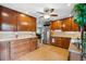 Spacious kitchen with ample cabinet space and tile flooring at 1586 S Field Ct, Lakewood, CO 80232