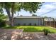 Spacious backyard with patio, lawn, and mature trees at 2635 Kearney St, Denver, CO 80207