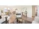 Chic living room with an open layout, sleek flooring, and a cozy seating area, perfect for entertaining at 2635 Kearney St, Denver, CO 80207