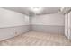 Finished basement with carpet, wainscotting and a window for natural light at 6666 S Pennsylvania St, Centennial, CO 80121