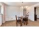 Bright dining area with natural light and classic chandelier at 6666 S Pennsylvania St, Centennial, CO 80121