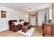 Comfortable living room with large TV and plush seating at 6666 S Pennsylvania St, Centennial, CO 80121