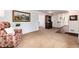 Cozy living area flows into an adjacent dining area and open kitchen at 6666 S Pennsylvania St, Centennial, CO 80121