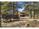 This property has an old wagon in the yard, enhancing its rustic charm and appeal at 77 Krestview Ln, Golden, CO 80401