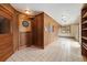 This is a paneled game room with tile floors, built-in shelves, and dart board at 77 Krestview Ln, Golden, CO 80401