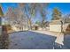 Spacious backyard patio and detached garage offer ample outdoor space at 3348 S Corona St, Englewood, CO 80113